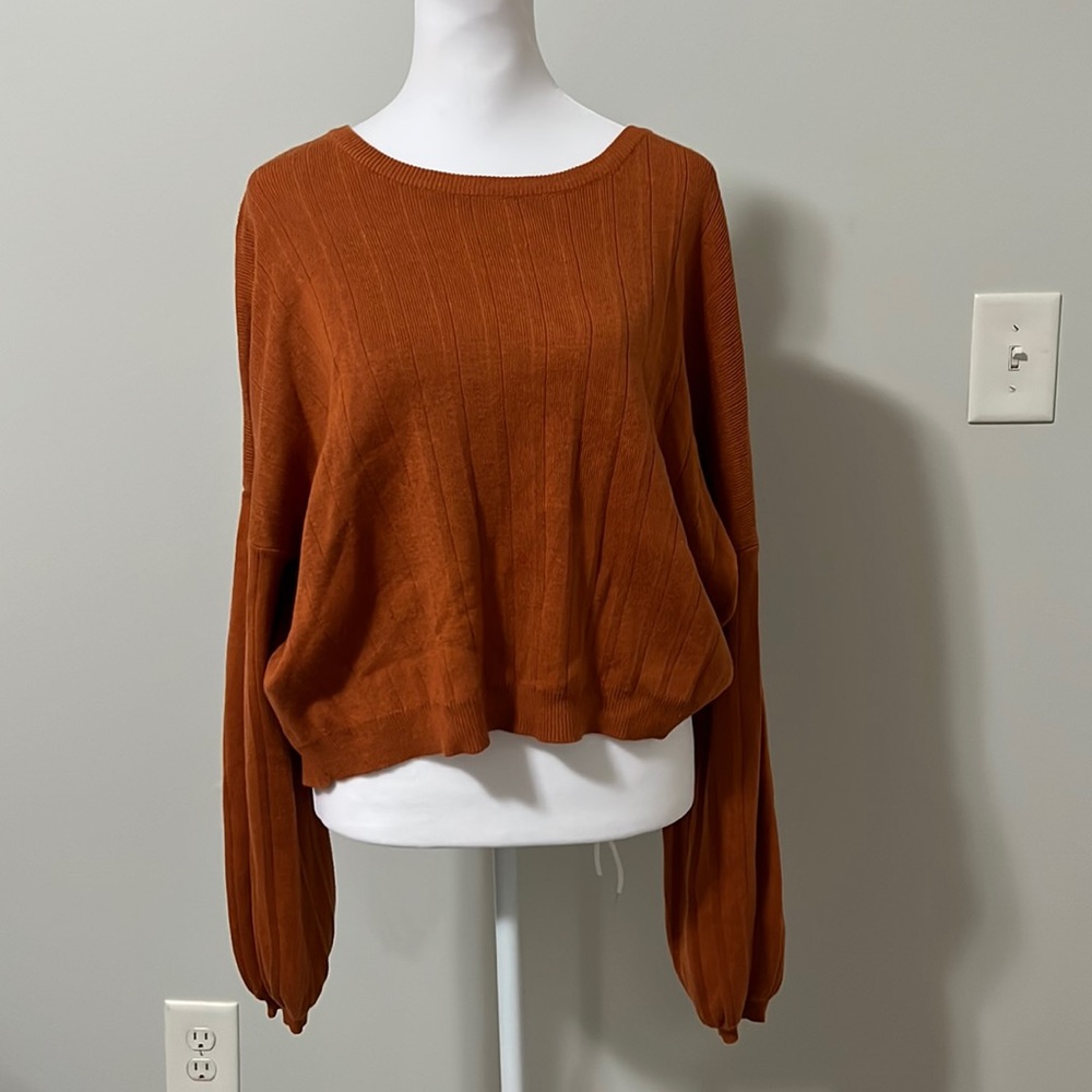 Balloon sleeved orange sweater